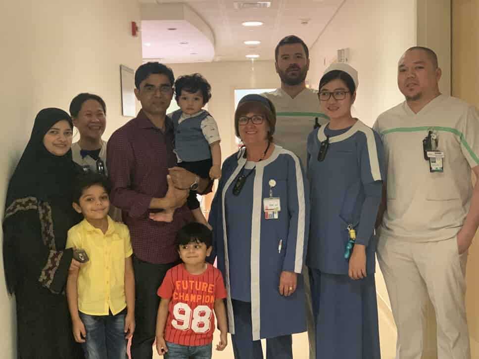 Hassan with his family with the Physical Therapy team at the Ponseti Clinic in Sidra Medicine 
