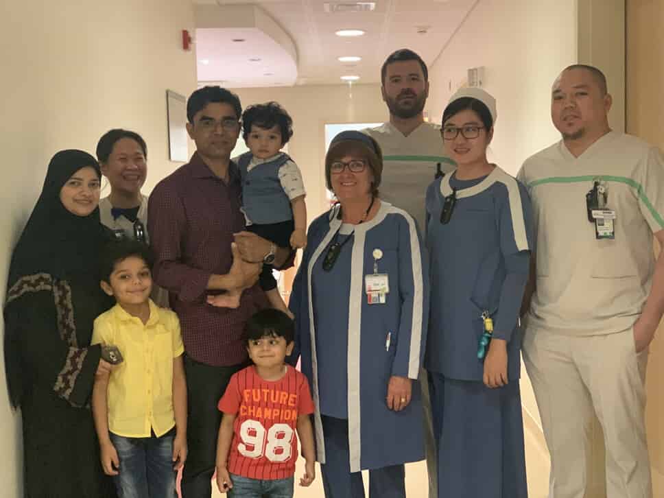 Hassan with his family with the Physical Therapy team at the Ponseti Clinic in Sidra Medicine